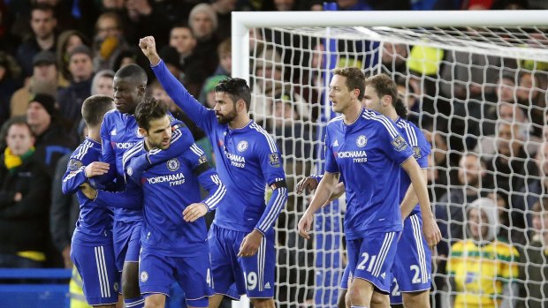 Drought broken: Chelsea's Diego Costa celebrates with teammates after scoring during the English Premier League soccer match between Chelsea and Norwich City at Stamford Bridge.