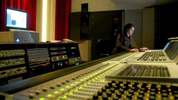 A recording and multimedia producer works the Sydney  Opera House studio.