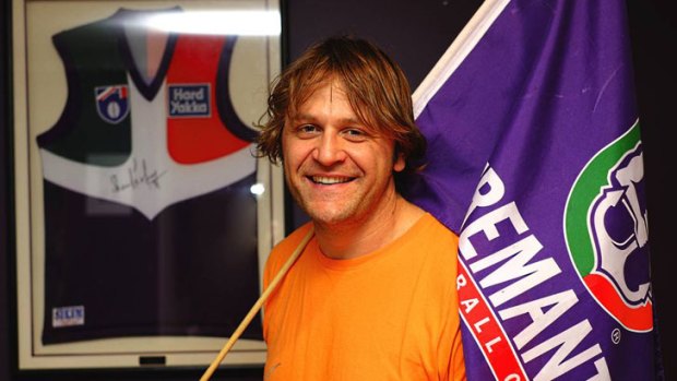 Passionate Dockers supporter Rob Gherardi has chartered a plane to take himself to watch the AFL Grand Final should the Dockers play in the final.