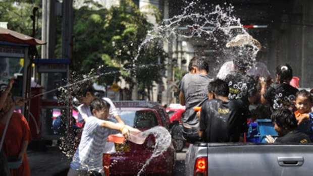 Good luck...Thais douse each other  in Bangkok as a traditional aspect of the  Songkran festival, which is regarded as Thailand's traditional New Year.