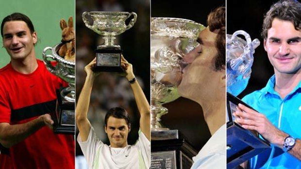 Four for the cabinet ... Roger Federer enjoys his Australian Open trophies.