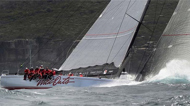 Supermaxi Wild Oats XI sailing out of Sydney Harbour.