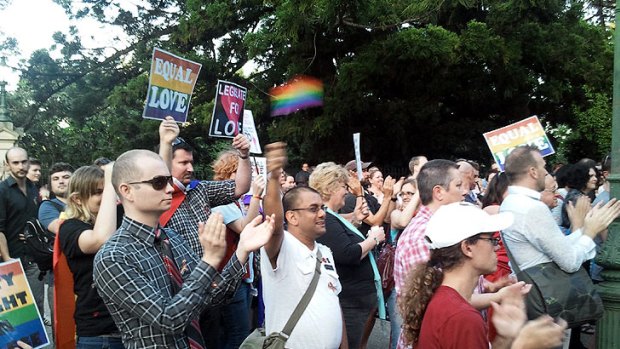 Supporters of the same-sex civil unions bill gather ahead of tonight's debate.