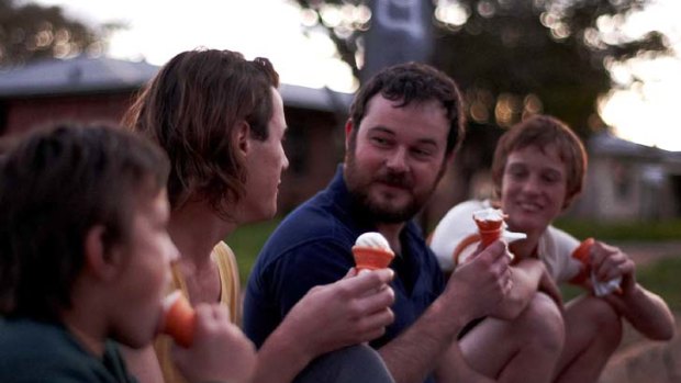 Killer company ... Jamie ( Lucas Pittaway, second from left) falls under the spell of John Bunting ( Daniel Henshall, third from left).