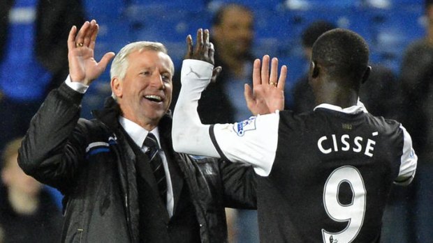 Magic ... Newcastle manager Alan Pardew congratulates Papiss Cisse.
