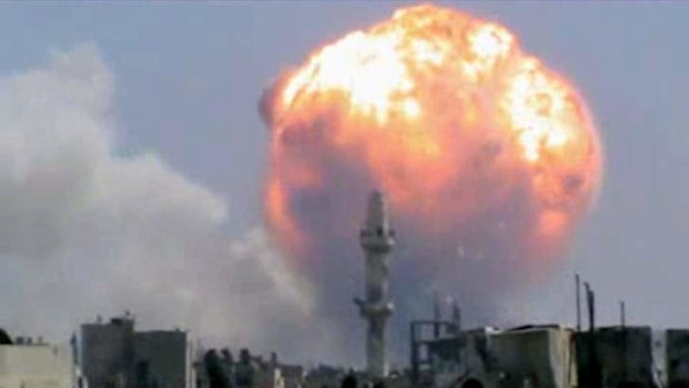 An explosion at a weapons depot in Homs last month: The CIA says there is a danger that weapons might fall into the hands of al-Qaeda.