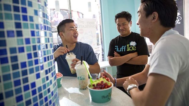 David Fung (left) and brother Andrew (near right) with Matthew Hui in Monterey Park.