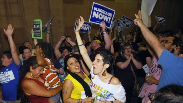 Equality ...  gay-marriage campaigners celebrate in New York.