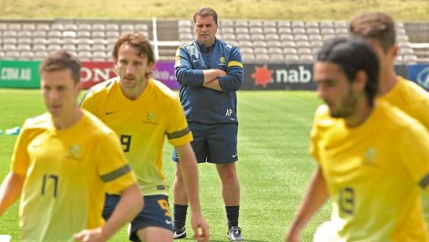 Drills sergeant: A hawk-eyed Ange Postecoglou keeps tabs on his players at a training session in Kogarah.