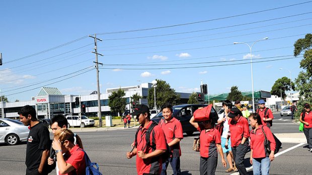 Workers leave Toyota's Altona plant yesterday, after being given the bad news.