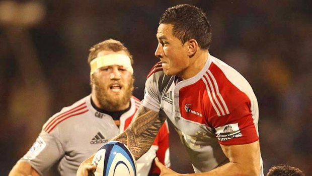 The Chiefs' Ben Afeaki tackles Crusader Sonny Bill Williams.