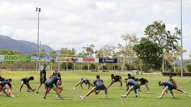Bend and stretch ... the Kangaroos went through their paces in Townsville this week before their trans-Tasman Test against New Zealand at Dairy Farmers Stadium tonight.