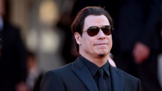 John Travolta "doesn't care" about the allegations made by his former employee that they were romantically involved.