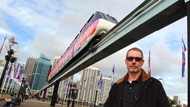 Big fan: Michael Sweeney, one of the first to get on the monorail, will also hop on its last ride.