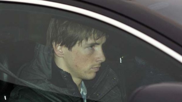 Fernando Torres arrives for training in Liverpool on Monday.