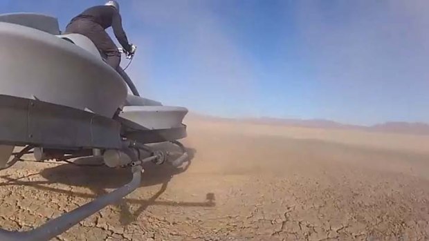 Just centimetres above the ground ... the hover bike in the US desert.