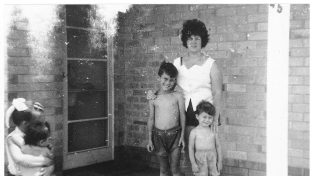 Jimmy and brother Alan with their mum on the front porch of their home in Elizabeth. 'That is the door Mum used when she left us.'