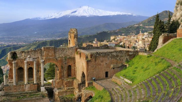 Taormina, the Teatro Greco (Greek theatre) and Mount Etna in the distance.