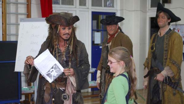 Shiver me timbers ... Johnny Depp holds a letter from Beatrice Delap (right).