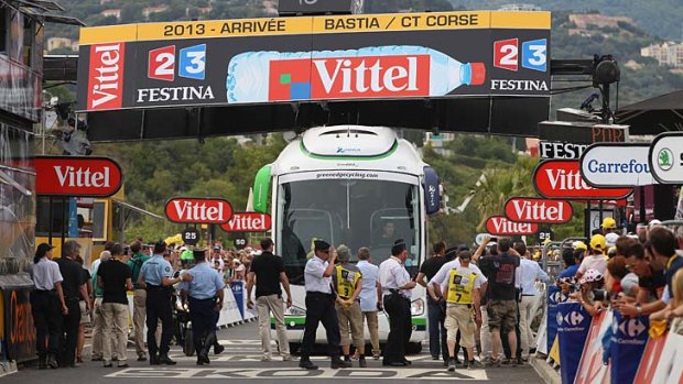 The Orica-GreenEDGE team bus collides with the finishing banner before the riders arrived at the end of stage one of the 2013 Tour de France.