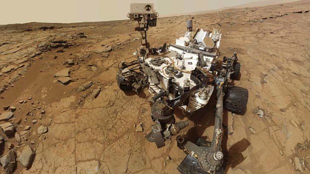 New milestone ... NASA's Mars rover Curiosity is the first to bore into a rock.