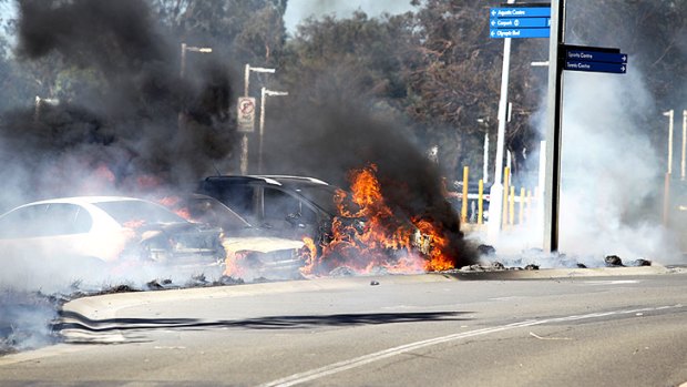 Explosions could be heard from the Sydney Olympic Park Athletic Centre, as the fire moved among the vehicles in the car park.