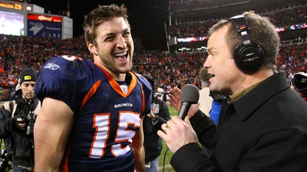 Star man ... Tim Tebow talks to the media after his winning pass against the Pittsburgh Steelers.