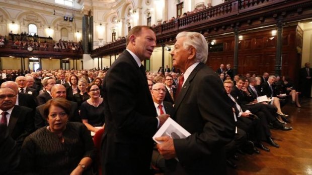 Tony Abbott and Bob Hawke at the memorial inside Sydney Town Hall.