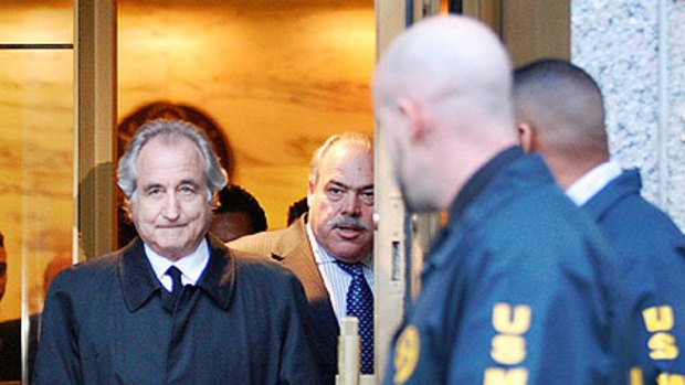 Bernard Madoff leaves court after a bail hearing in New York in 2009.