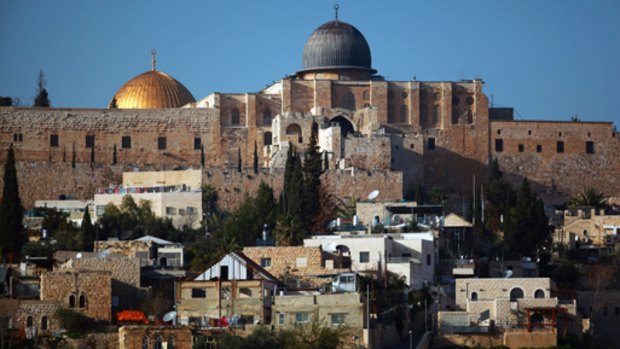 Al-Aqsa mosque and the Dome of the Rock loom over Silwan, where Israel plans to demolish palestinian homes.
