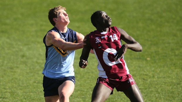 GWS academy player Jacob Hopper (left).