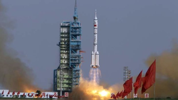 The Long March II-F rocket loaded with a Shenzhou-9 manned spacecraft carrying three Chinese astronauts lifts off from Jiuquan Satellite Launch Center, Gansu province, in June last year.