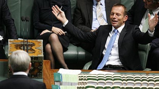 Tony Abbott spars with former prime minister Kevin Rudd during Question Time.