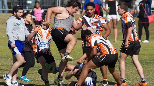 It’s meant to be fun: Tempers flare at last weekend’s match between the Penrith Waratahs and Western City Tigers.