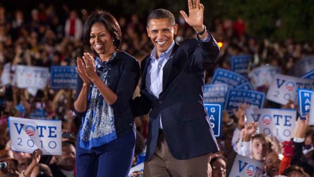 Time to fire up: Michelle and Barack Obama on the campaign trail in Columbus, Ohio.