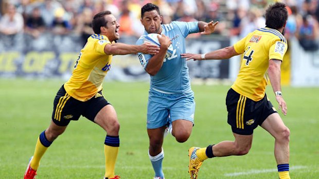 Flying start: Benji Marshall runs the ball.