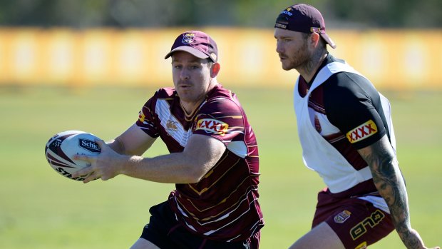 Ready to step up: Bench utility Michael Morgan runs with the ball during a Queensland State of Origin training session on Sunday in Gold Coast.