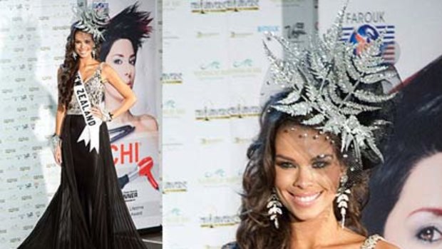 Miss New Zealand 2010 Ria van Dyke wearing a dress by a US designer and a headpiece by Natalie Chan.