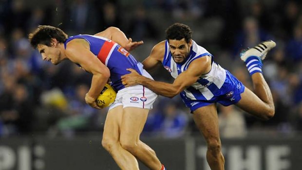 Roo Daniel Wells and Bulldog Ryan Griffen.  Western Bulldogs and North Melbourne are big winners under the plan.