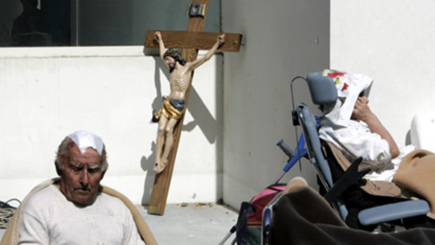 Patients are treated outside the St. Salvatore Hospital, in L'Aquila, central Italy.