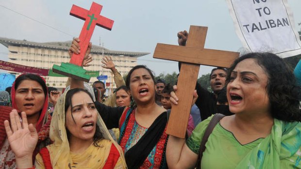 Pakistani Christians shout slogans as they take part in a protest to demand better protection for their community.