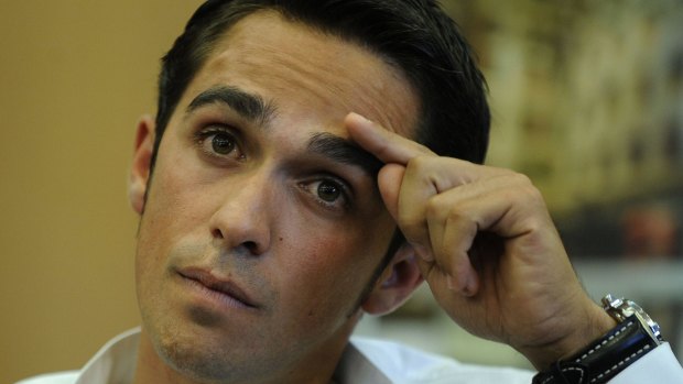 Three-time Tour de France champion Alberto Contador gestures during a press conference on September 30, 2010, in Pinto, Spain, after he was suspended for failing a dope test.