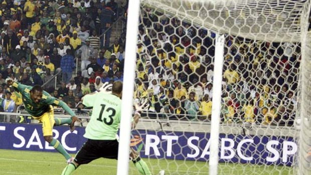 Siyabonga Sangweni of South Africa buries the ball into the back of the net.
