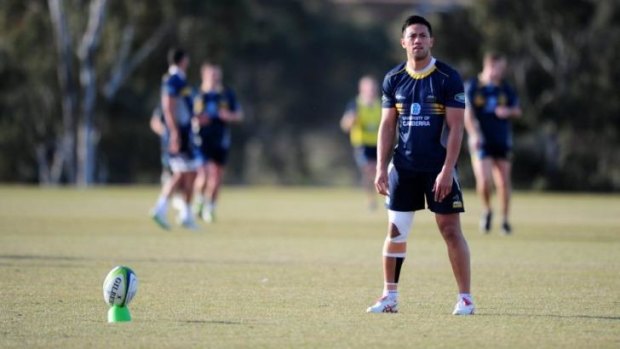 Brumbies player Christian Lealiifano lines up a kick during training on Monday.