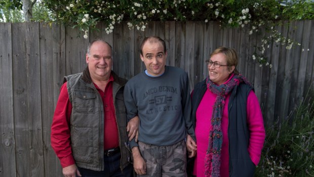 Andrew Johnson with his parents, David and Deb Johnson.
