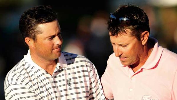 Good sport . . . Palmer consoles Allenby at the 18th.