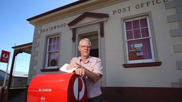 Small town hub: Bruce Keeley at Braidwood Post Office, which he has run for 16 years.