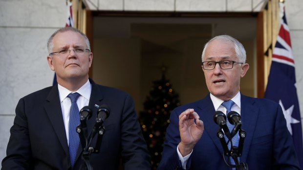 Treasurer Scott Morrison and Prime Minister Malcolm Turnbull: don't celebrate their tax cut promises too soon.