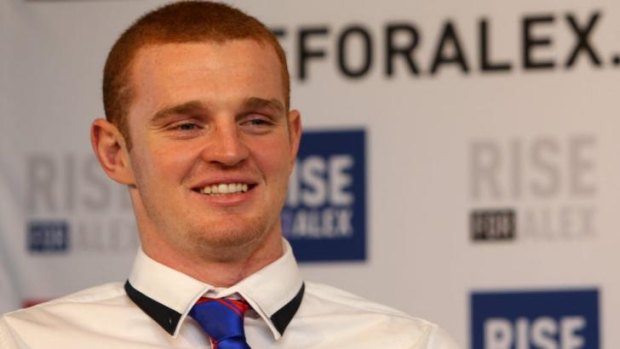Brave lad: Alex McKinnon addresses the media for the first time since his accident earlier this week.