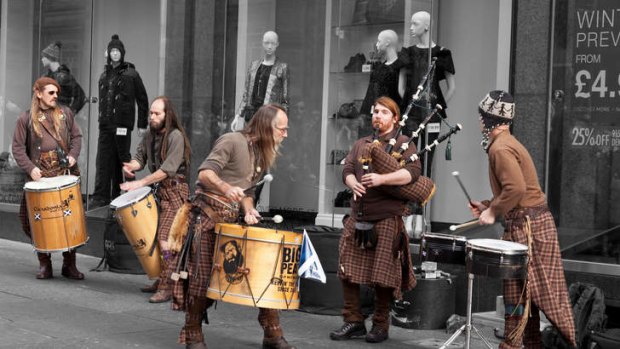 A different drum: Clanadonia, an updated Scottish traditional band, busks in Buchanan Street. Photo: Alamy